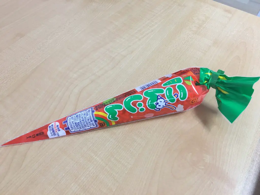 Ninjin Classic Puffed Rice Snack in Carrotlike Packaging